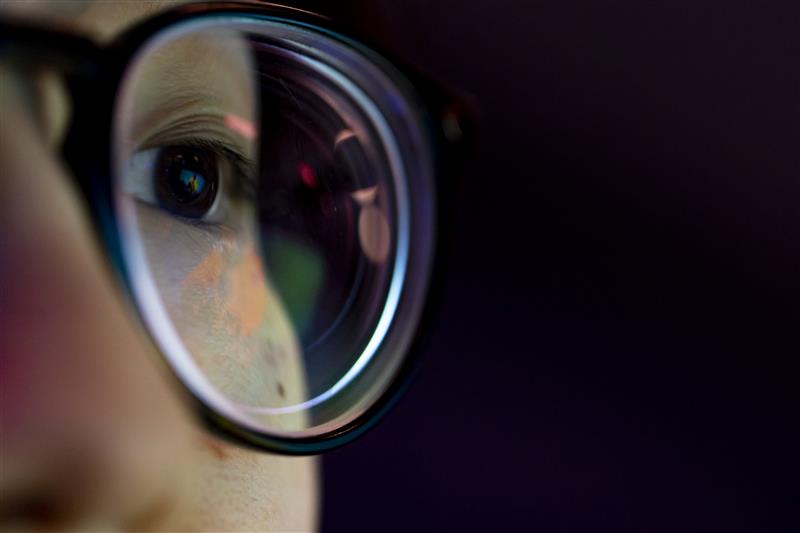 Close up view of a person with glasses